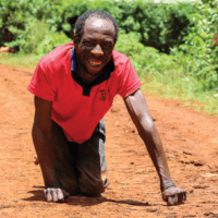 Anthony Wanyoike’s disability left him crawling on his hands and knees, unable to perform basic tasks.